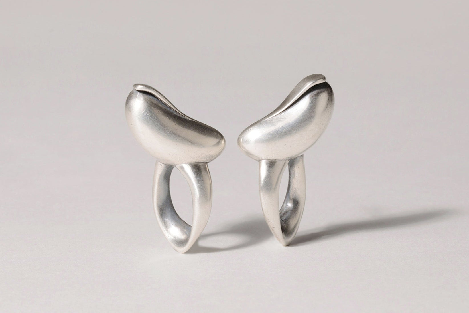 TWISTED CUT-OUT OVAL EARRINGS